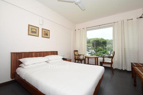 Service Apartments in Thevara , Cochin | Standard Bedroom